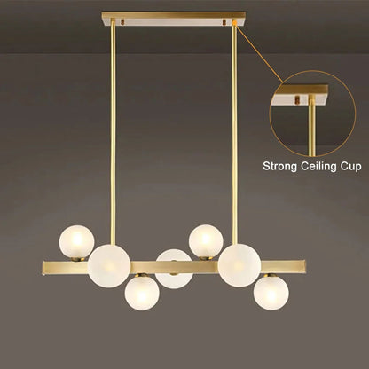 White Globe Shade 7-Light Linear Island Light in Gold - 