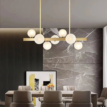 White Globe Shade 7-Light Linear Island Light in Gold - Homary